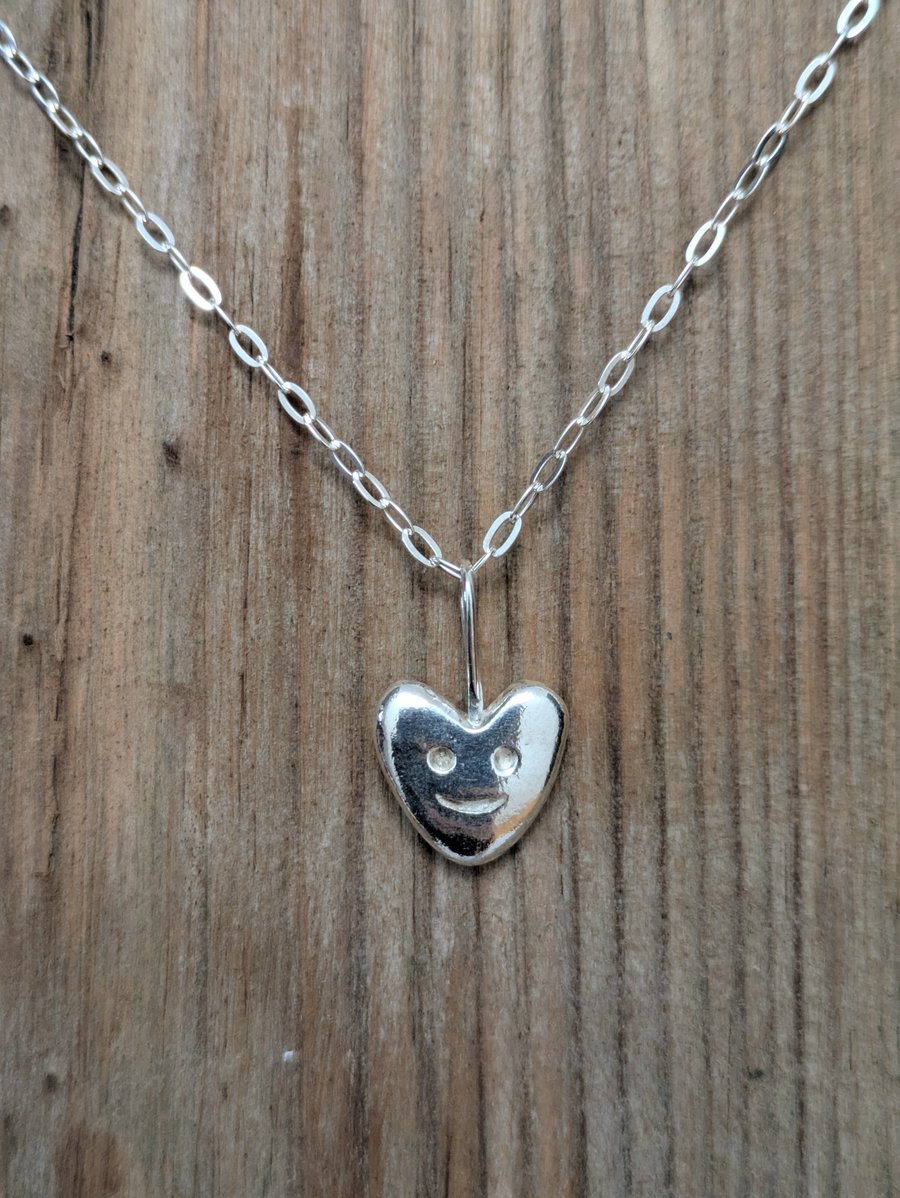 Sterling silver smiley heart pendant 