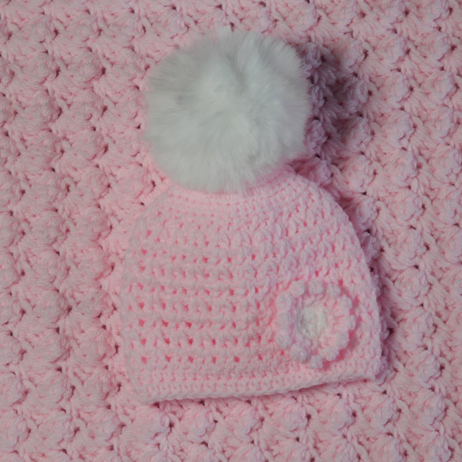Handmade Crochet Baby Girl Hat with Floral Applique and Faux Fur Pom Pom 