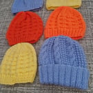 Hand knitted hats for newborn babies
