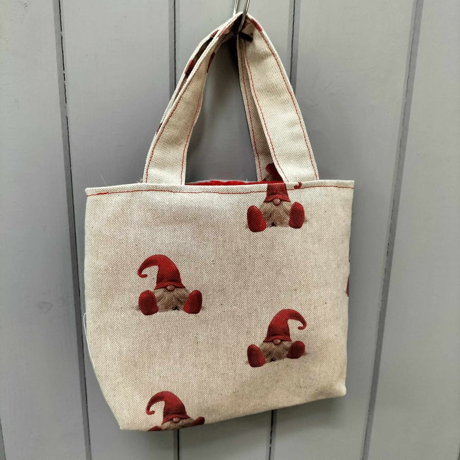 Linen look small tote bag with red gonks