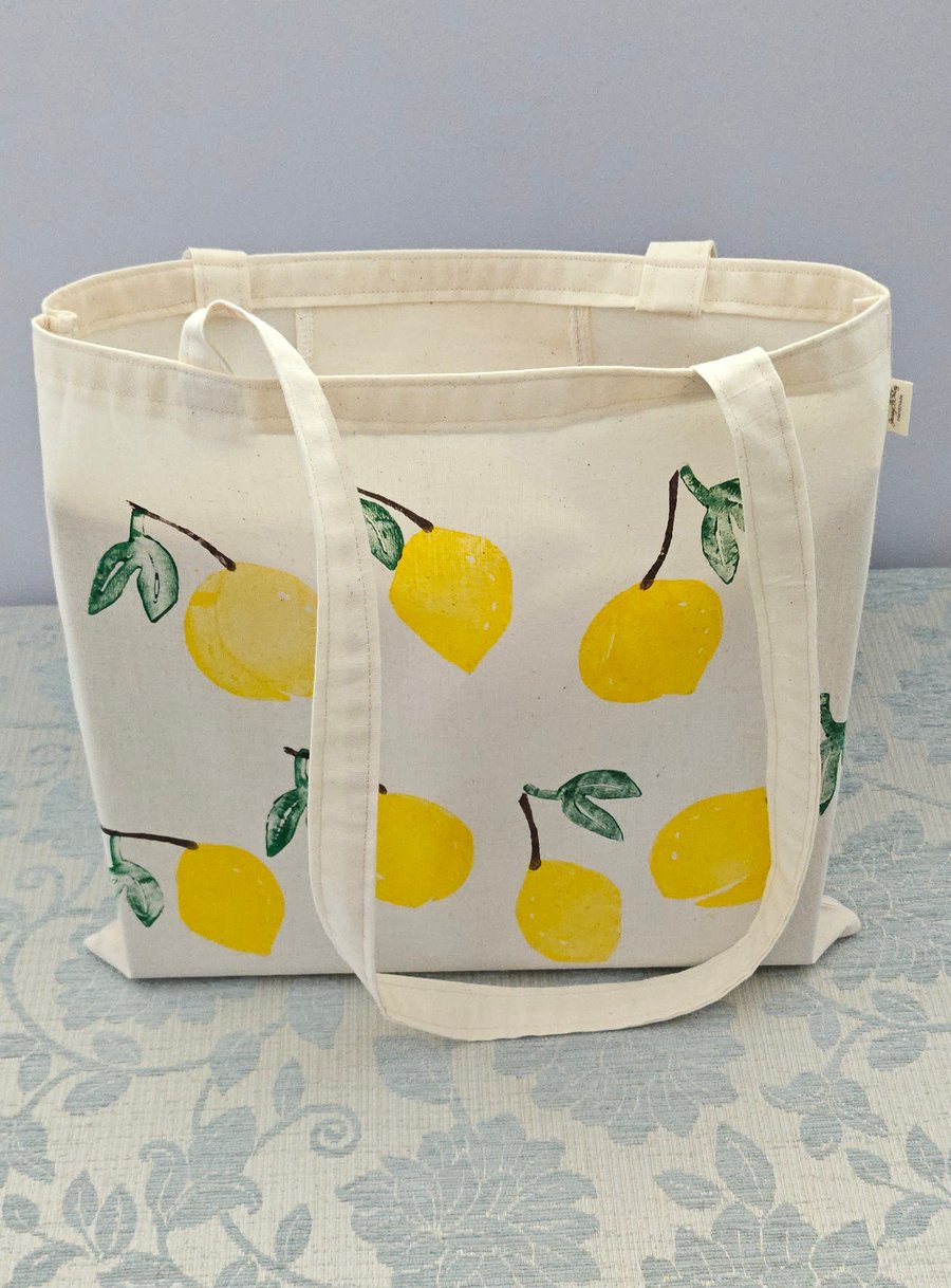 Hand printed lemon tote bag with pocket.