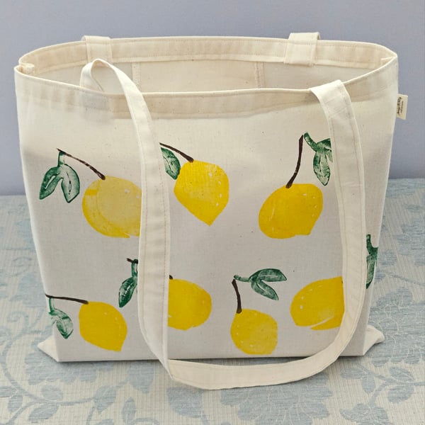 Hand printed lemon tote bag with pocket.