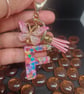 Initial keyring made from epoxy resin in the shape of the letter F