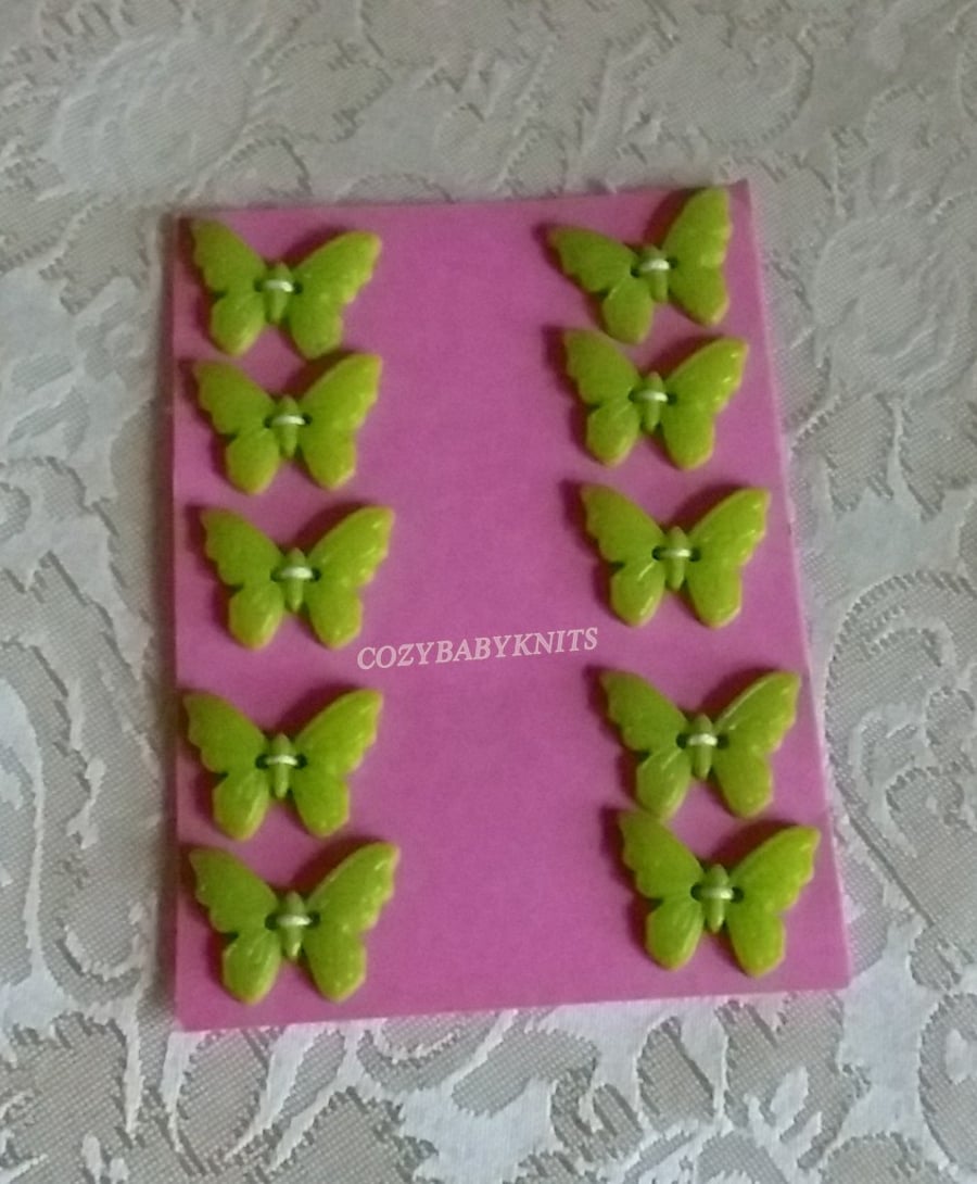 GREEN PLASTIC BUTTERFLY BUTTONS WITH TWO HOLES FOR ATTACHING 