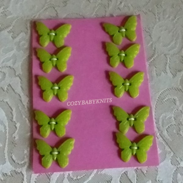 GREEN PLASTIC BUTTERFLY BUTTONS WITH TWO HOLES FOR ATTACHING 