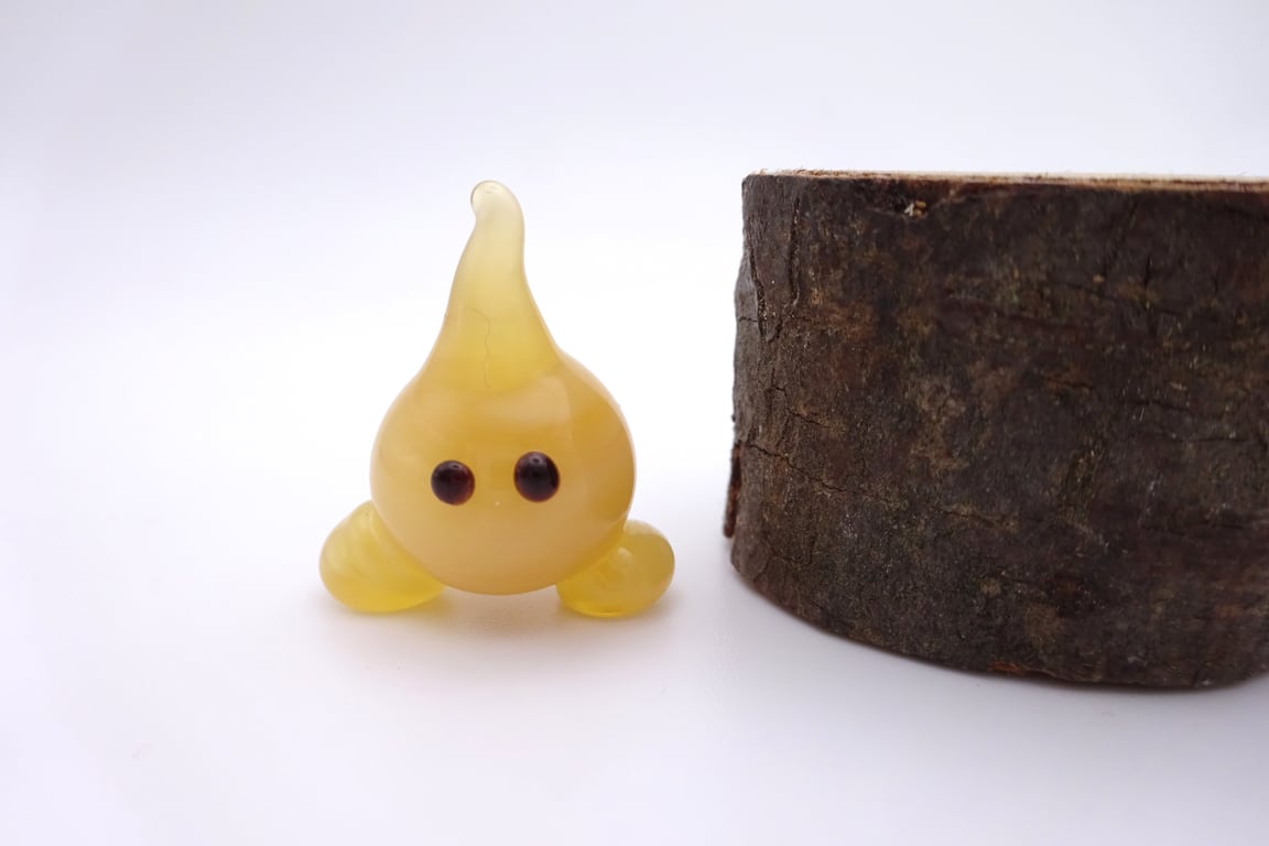 small glass wisp figure