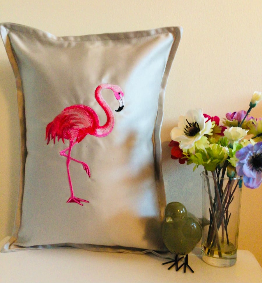 Flamingo embroidered cushion.