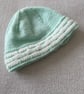 Aqua coloured baby’s hat with a cream border - Image 1