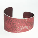 Flock of birds cuff - orangey red