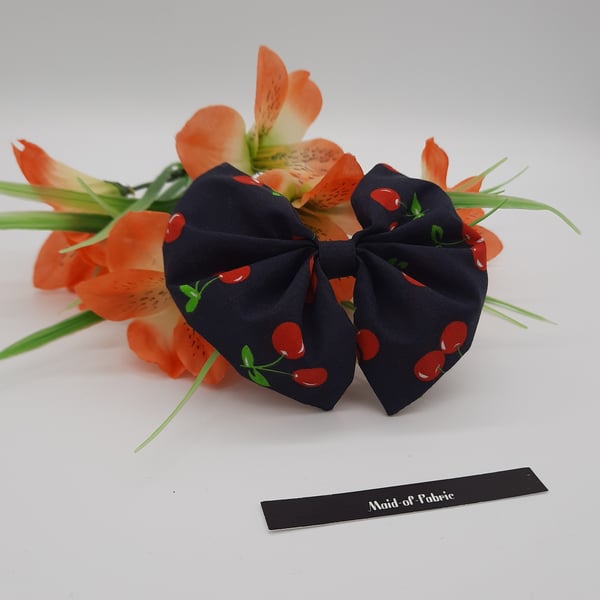 Bow clip, navy blue cherry,  3 for 2 offer. 