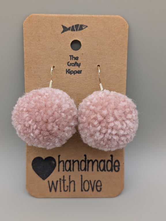 Handmade pom pom earrings.