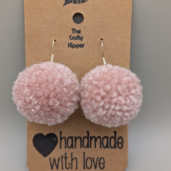 Handmade pom pom earrings.