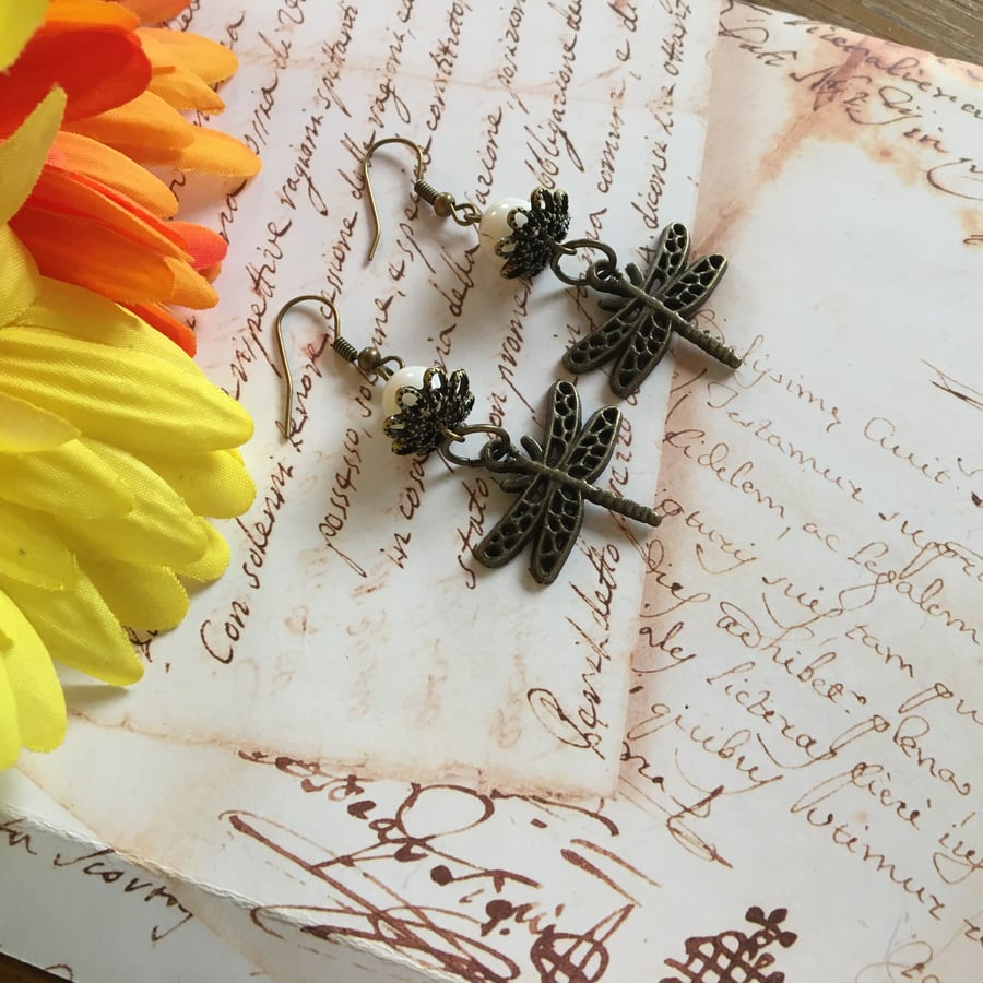 Brass garden dragonfly dangle earring. 