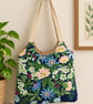 Two bags in one.  Lined tote bag