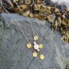Gold silver mother of pearl disc statement necklace