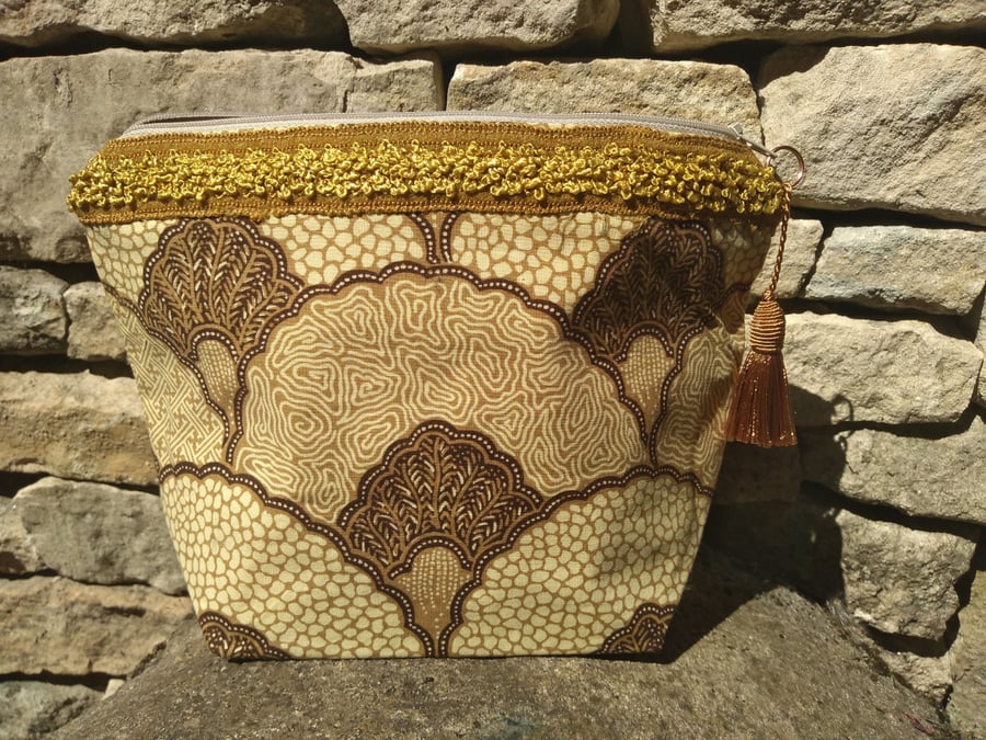 A small Vintage Fabric Cosmetic or Make-up Bag