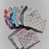 Choice of two mix & match washable face coverings. Free storage pouch & postage