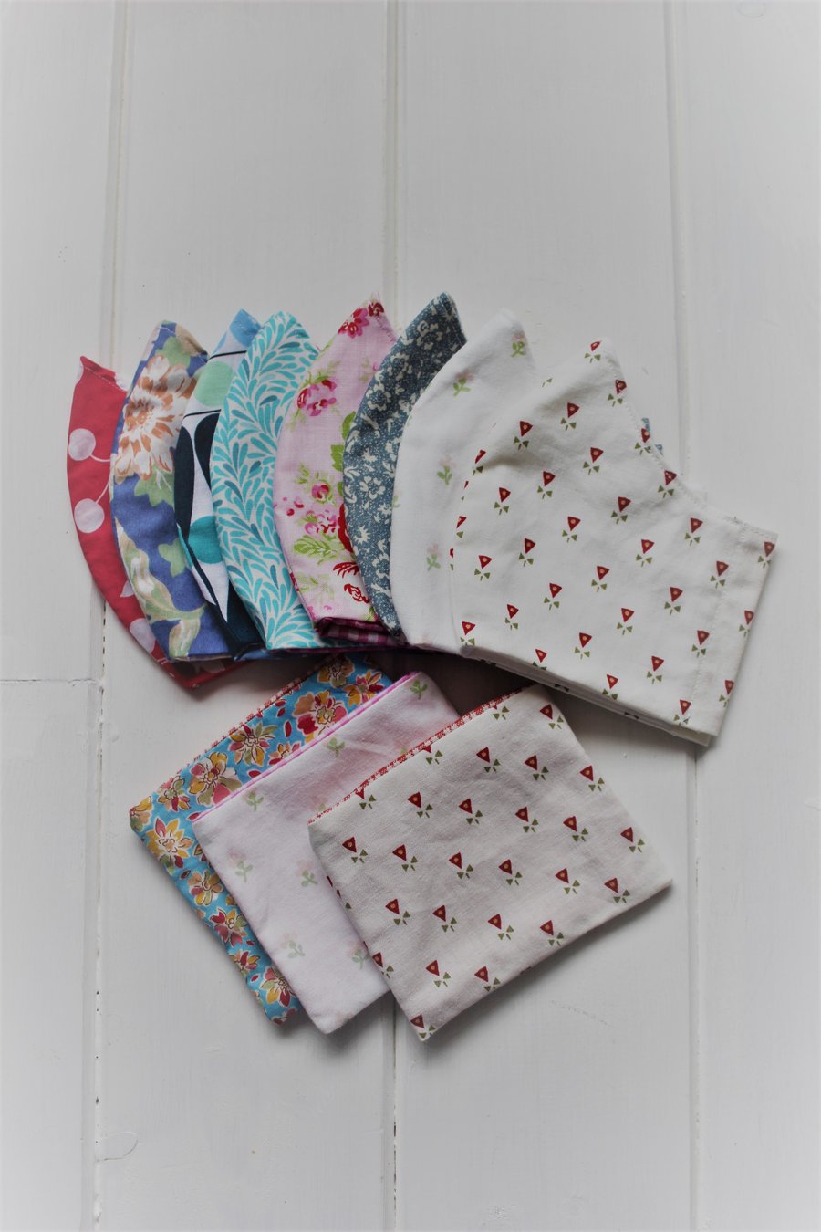 Choice of two mix & match washable face coverings. Free storage pouch & postage