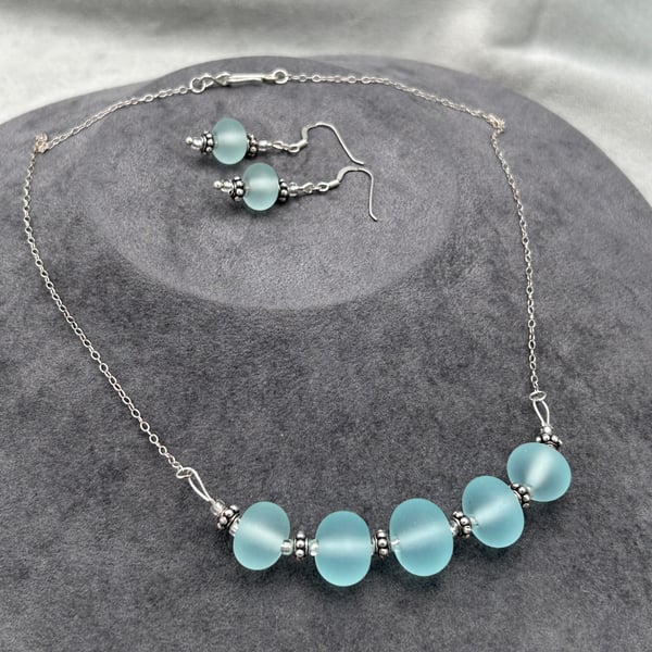 blue seaglass etched effect lampwork glass beaded necklace and earring set