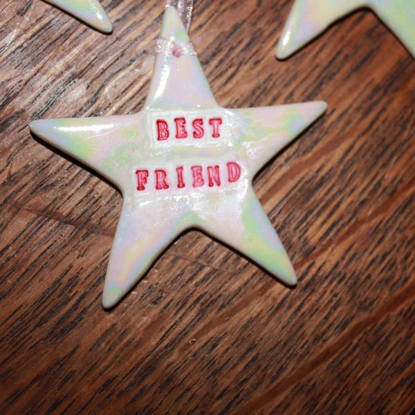 Handmade 'Best friend' porcelain paper clay star with mother of pearl lustre