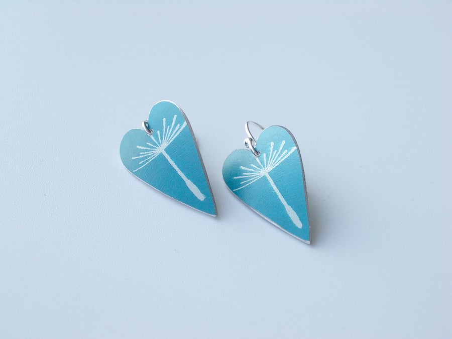 Dandelion seed heart earrings in blue