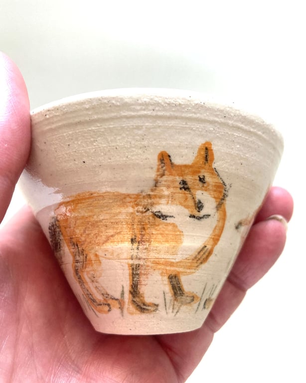 Small cup with foxes and rabbit