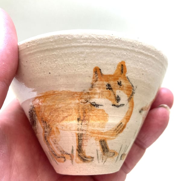 Small cup with foxes and rabbit