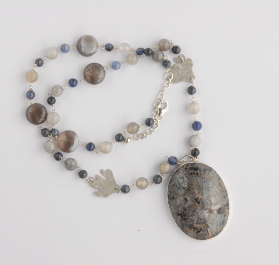 Blue grey fossilised coral silver necklace