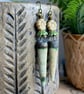Artisan Ceramic Spike Earrings with Czech Glass Flowers. Cream, Bronze & Green - Image 1