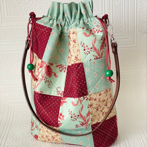 Patchwork quilted drawstring bag