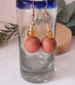 Dangly polymer clay earrings in dark salmon pink and amber