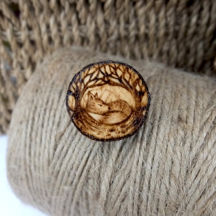 Sleepy fox tree slice pyrography brooch. Rustic branch pin.