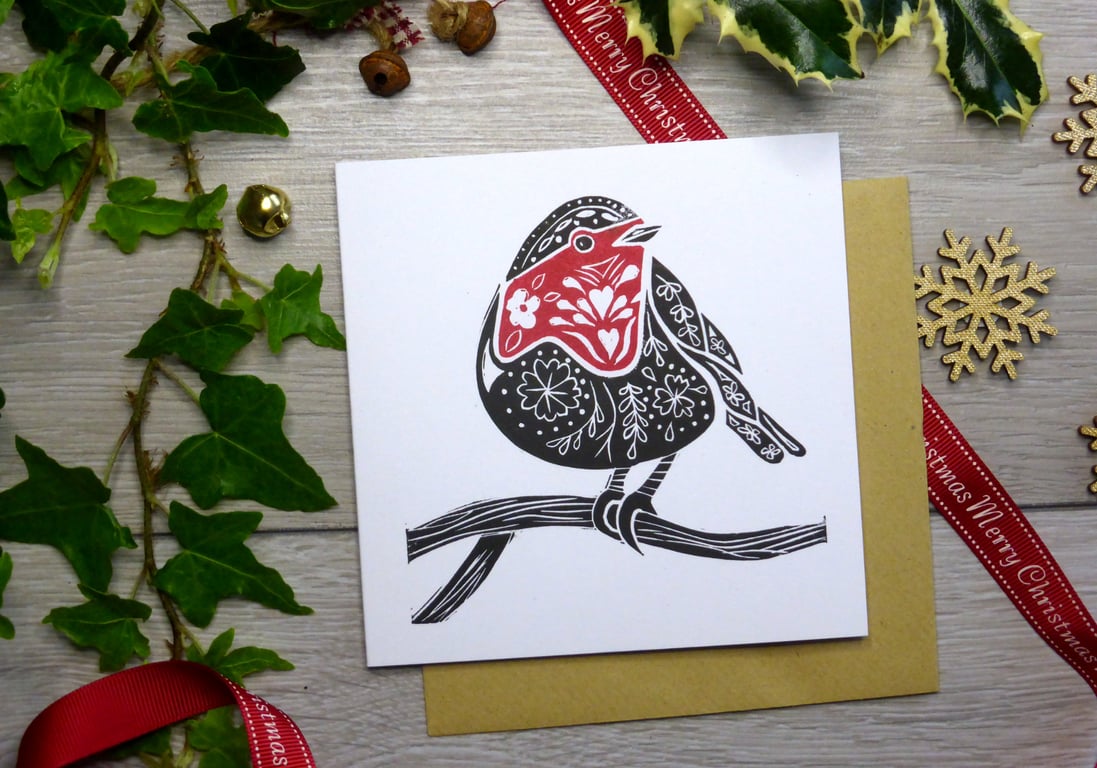 Robin Christmas card in black and red, handprinted from a linocut