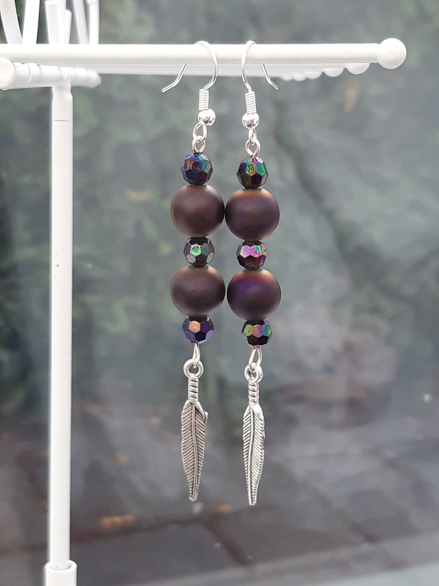 Purple feather drop earrings
