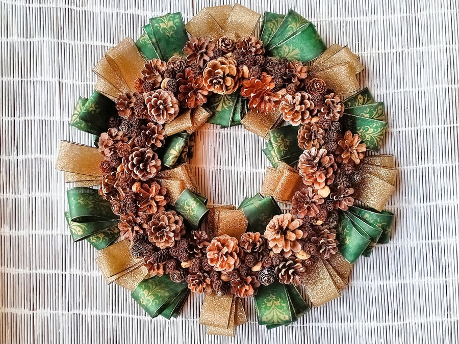Cone and Ribbon Christmas Wreath in Green and Gold