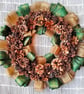 Cone and Ribbon Christmas Wreath in Green and Gold - Image 1