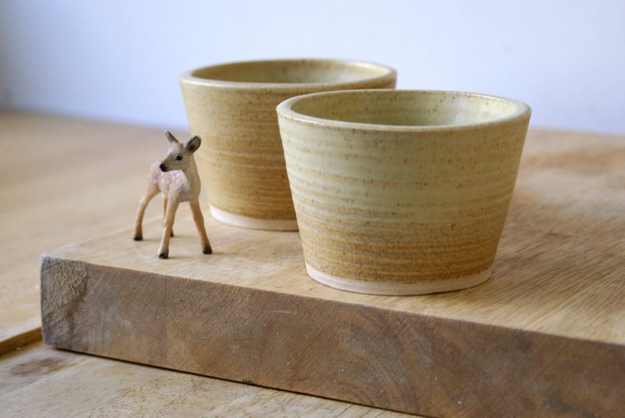Two stoneware pottery beaker cups - glazed in natural brown