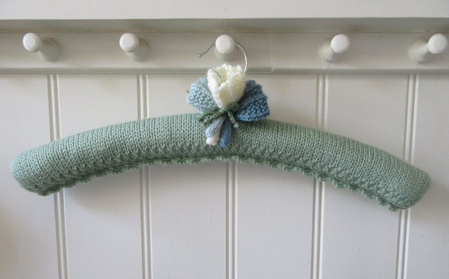 Clothes hanger coat hanger - pale green with crocus flowers