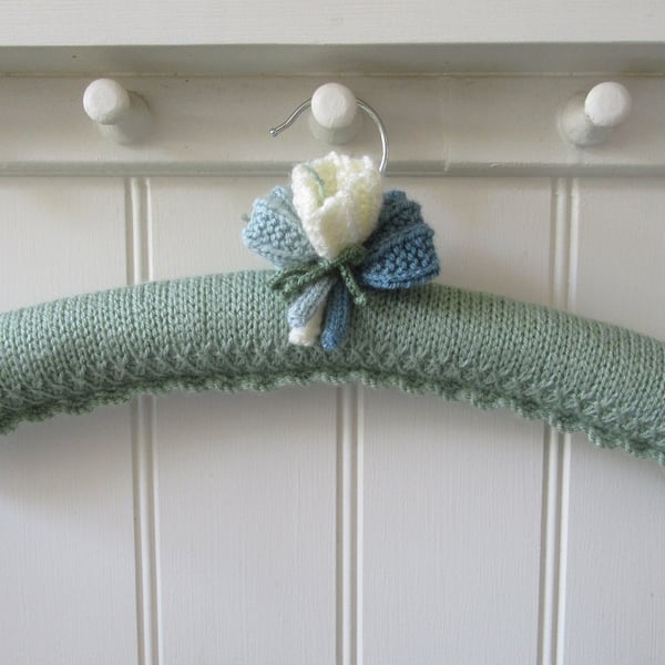 Clothes hanger coat hanger - pale green with crocus flowers