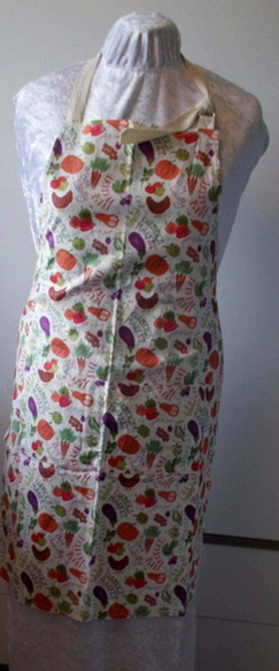 Hand made full apron with print of fresh fruit and veg.
