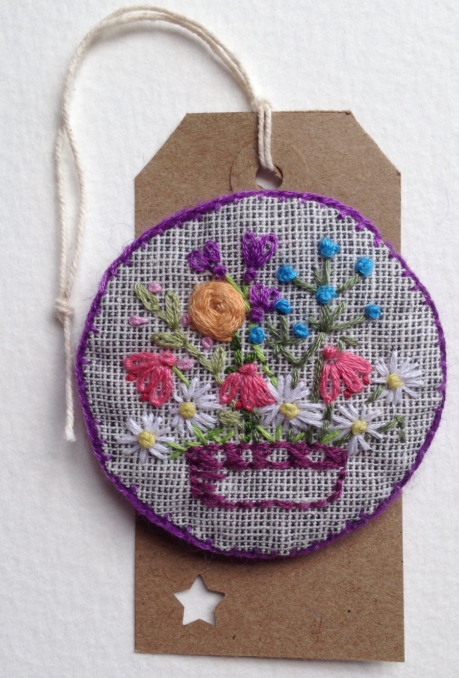 Embroidered textile brooch