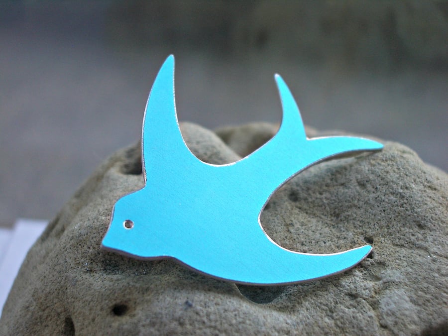 Swallow brooch in sky blue