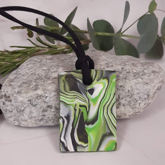 Bright green and black rectangular polymer clay pendant