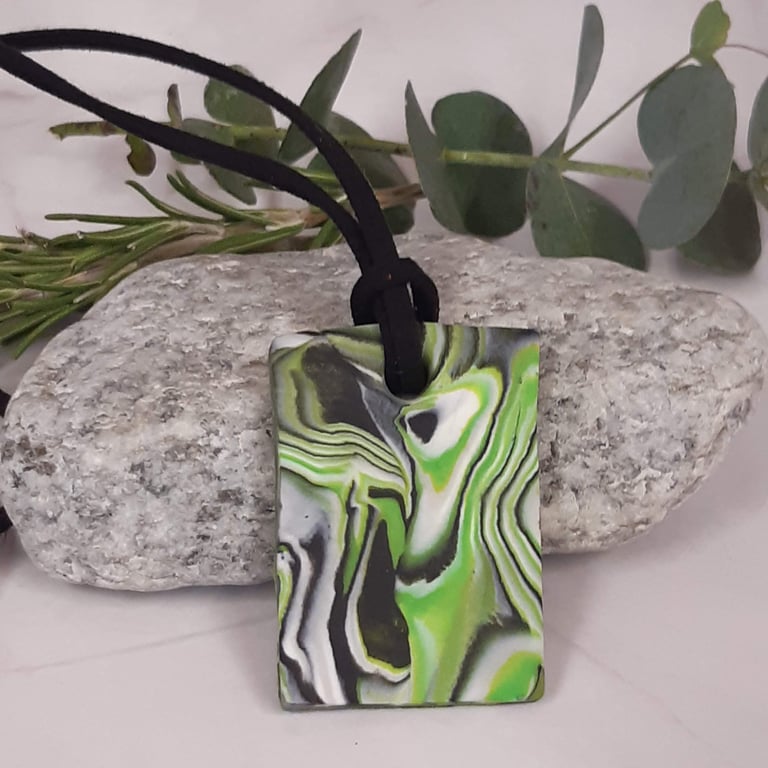 Bright green and black rectangular polymer clay pendant