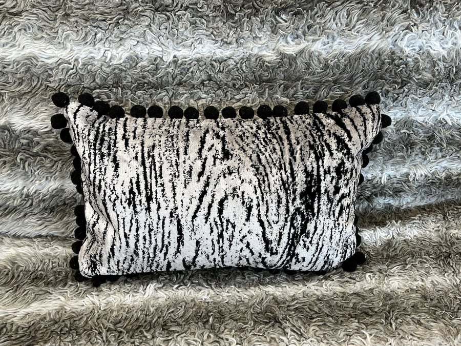 stylish velvet, and pompom animal print cushions