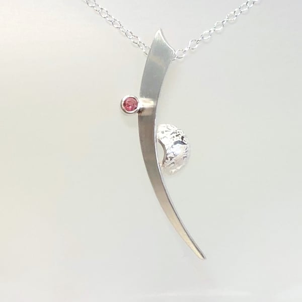 Curved Silver Pendant with Pink Topaz