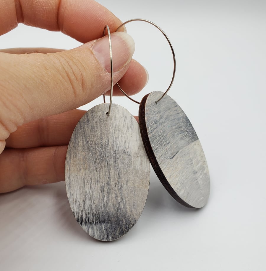 Grey and white hand printed dangle oval shaped earrings 