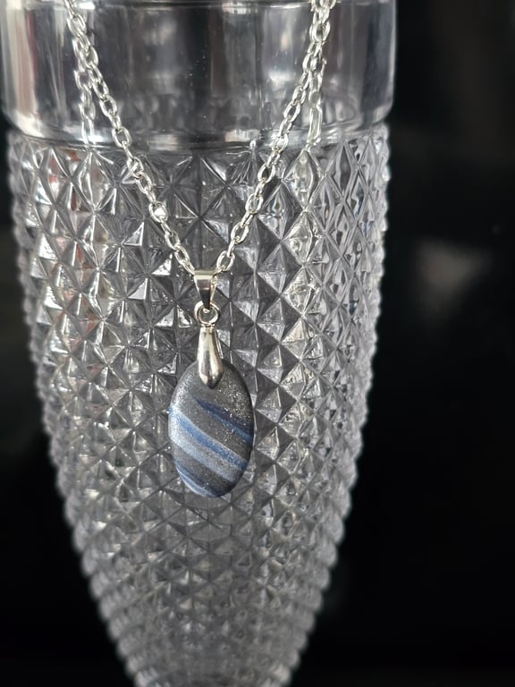 Polymer clay oval necklace on a silver plated chain