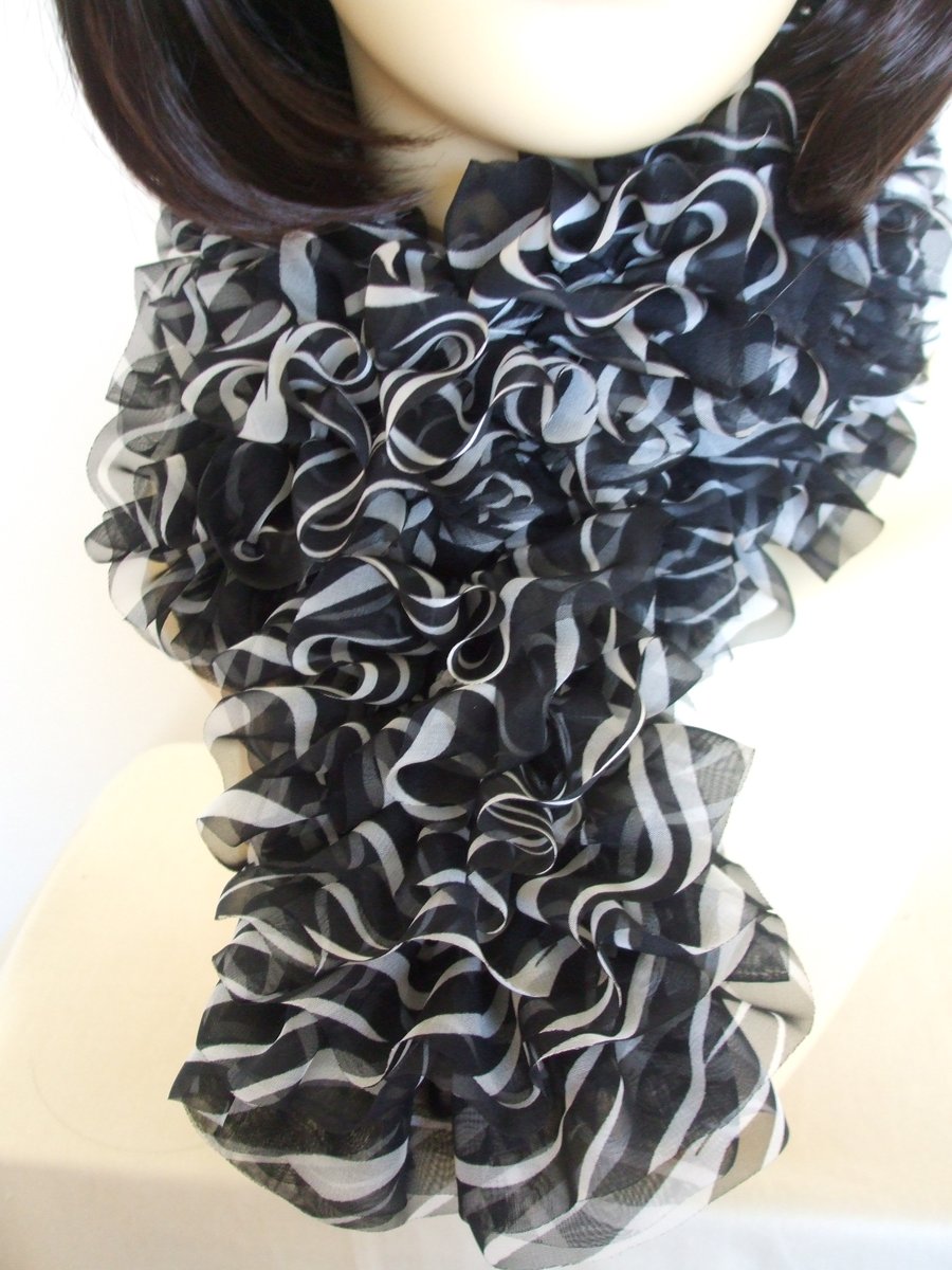 Knitted Frilly Ribbon Scarf in Black & White Zebra Print