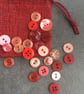 Pink Red assortment of pre loved shirt buttons - Image 1